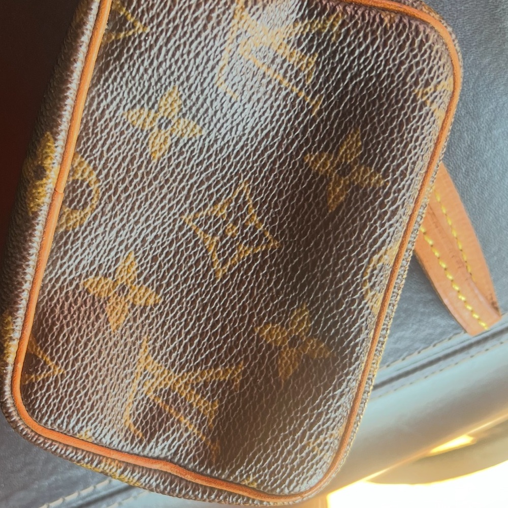 Louis Vuitton Brown Monogram Canvas wristlet with Tan Trim